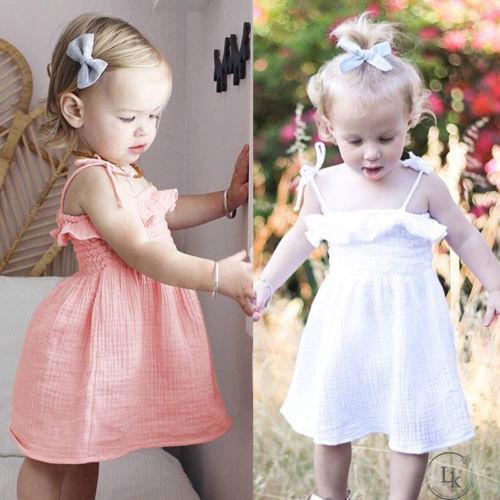 Đầm hai dây phối nơ xinh xắn cho bé gái