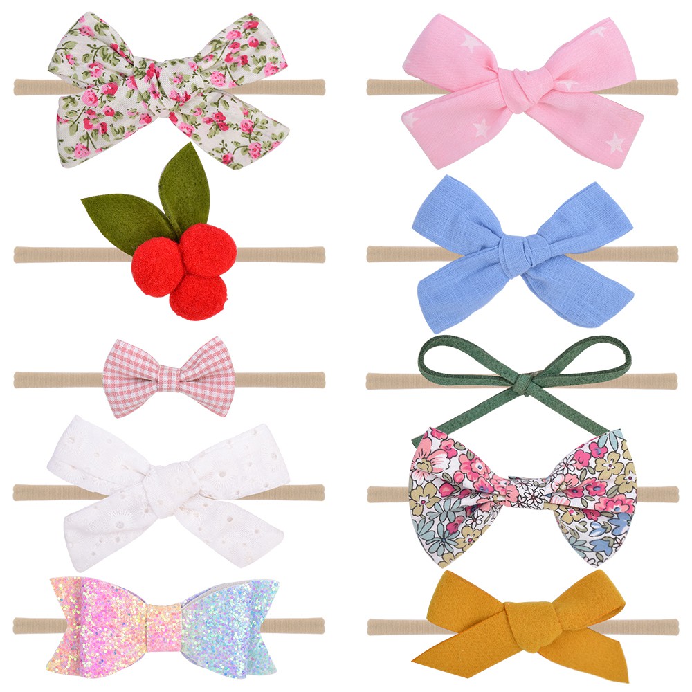 Băng đô KIDSBOWS đính nơ in hoa xinh xắn cho bé gái