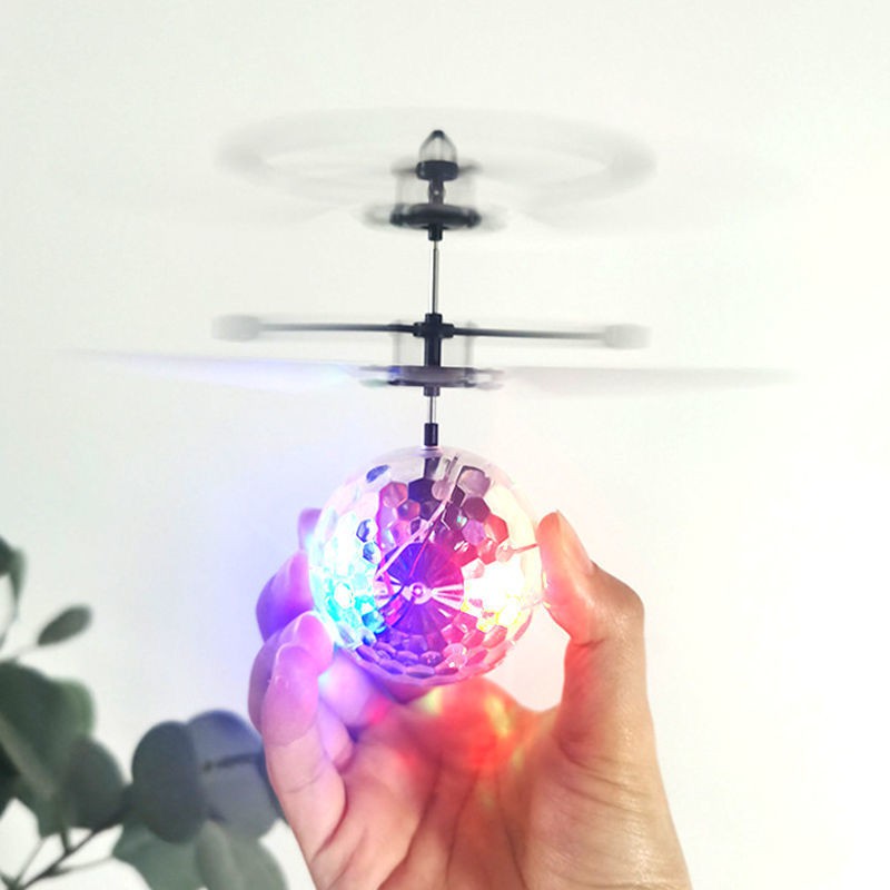 Ánh sáng đầy màu sắc Cảm ứng của máy bay tay Đồ chơi trẻ em Điều khiển từ xa Mini Drone lắc với đoạn