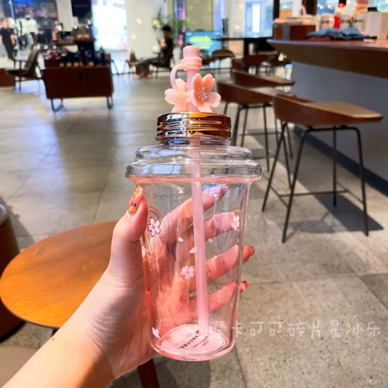 Cốc uống nước Starbucks hoa anh đào màu hồng có ống hút