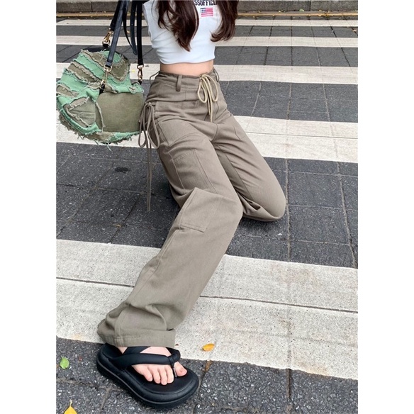 Quần jeans phối dây