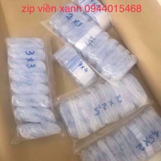Một bịch zip viền xanh kích thước nhỏ(một bịch là 100tui)