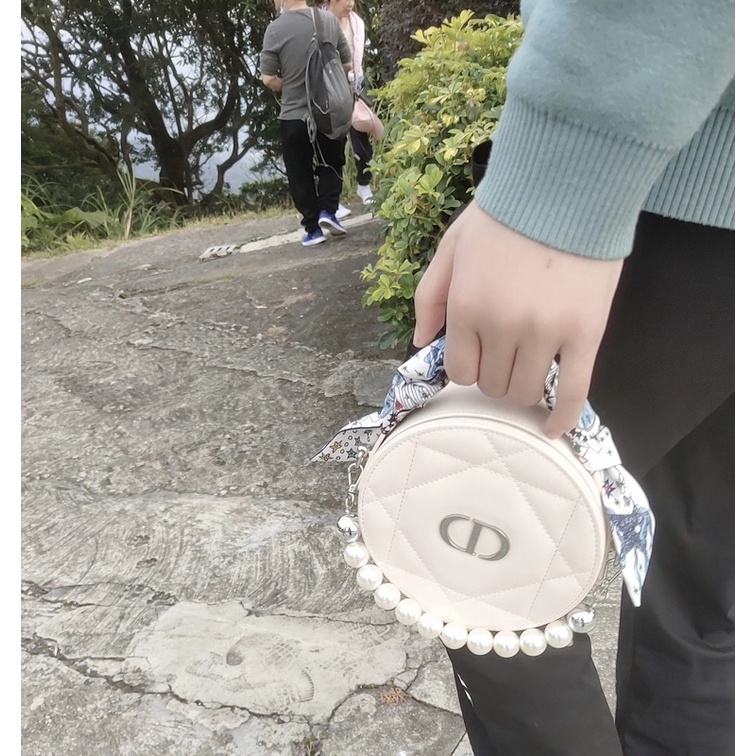 Túi tròn Gift Dio pouch  -Hàng VIP săn sale từ singapore CÓ GƯƠNG Ở TRONG TÚI