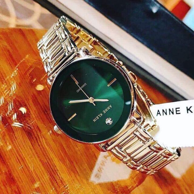 Đồng hồ nữ Anne Klein AK/2496GNGB dây kim loại vàng mặt viền gương xanh ngọc lục bảo sang trọng