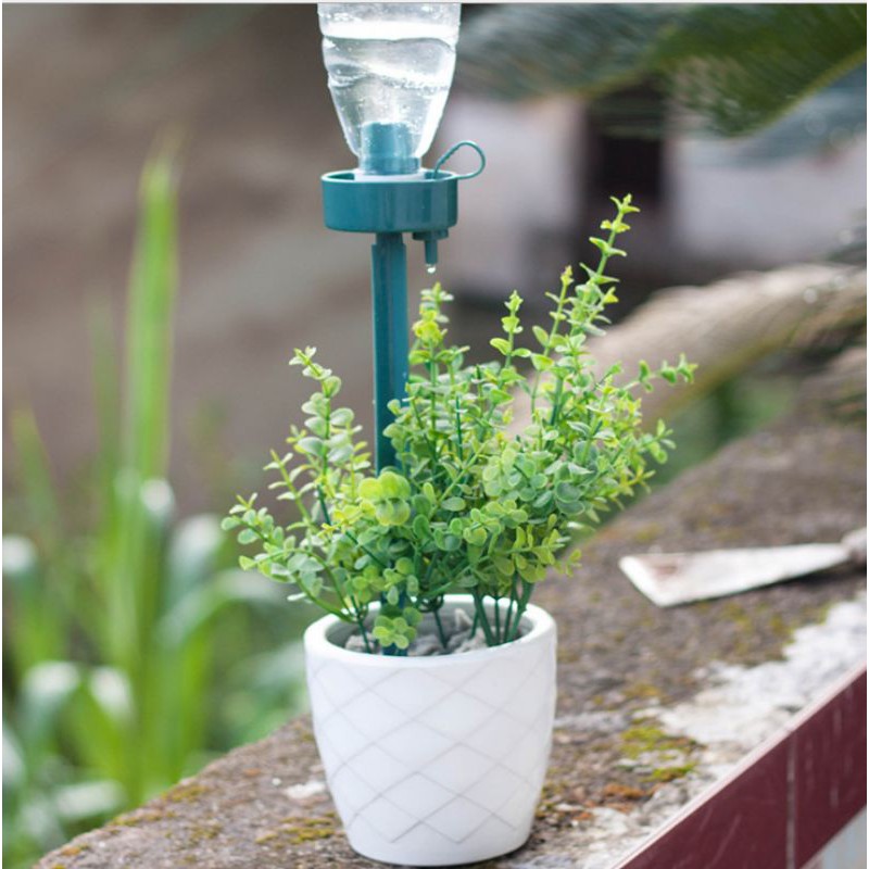 Dụng cụ tưới nước cho chậu cây,,,