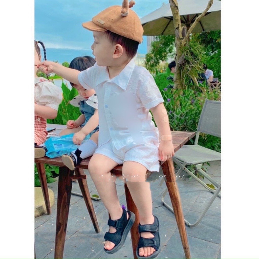 Bộ đũi trơn cổ vest cộc tay đi biển bé trai