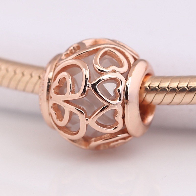 charm pan xỏ ngang tim nổi vàng hồng bạc s925