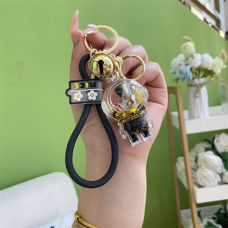 Móc Khóa Xe Hơi Hình Phi Hành Gia Bằng Acrylic Màu Vàng Đen Sáng Tạo