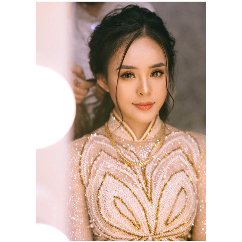áo dài cưới đính nhiều hạt màu kem đồng