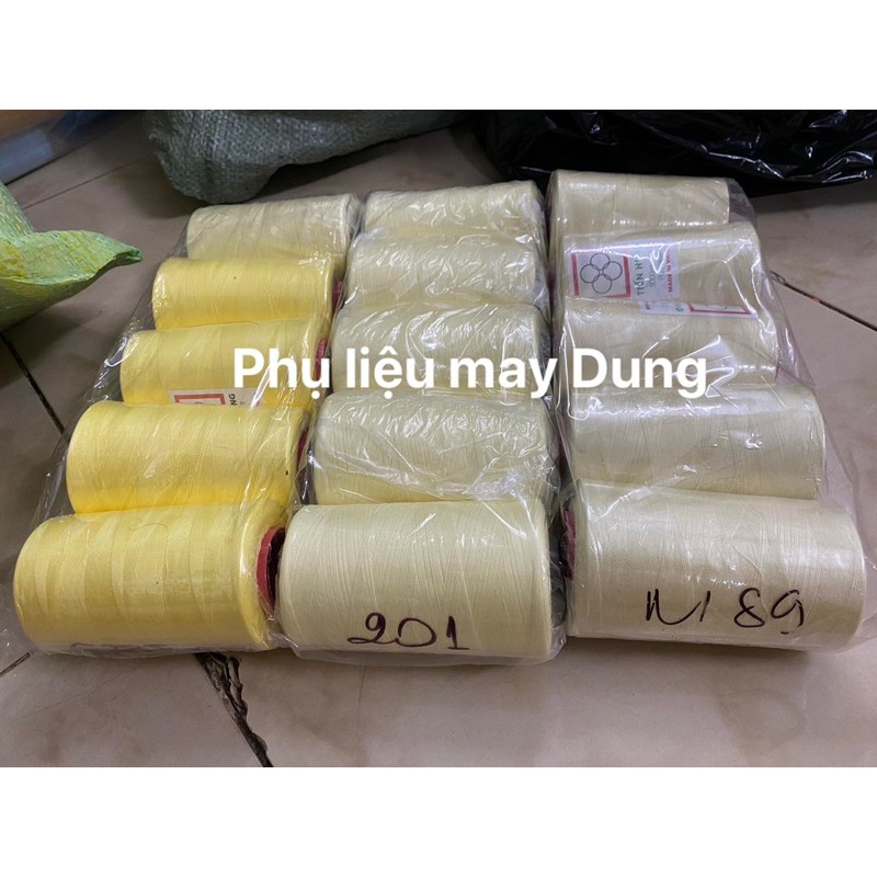 Chỉ may ống 5000m vàng lợt