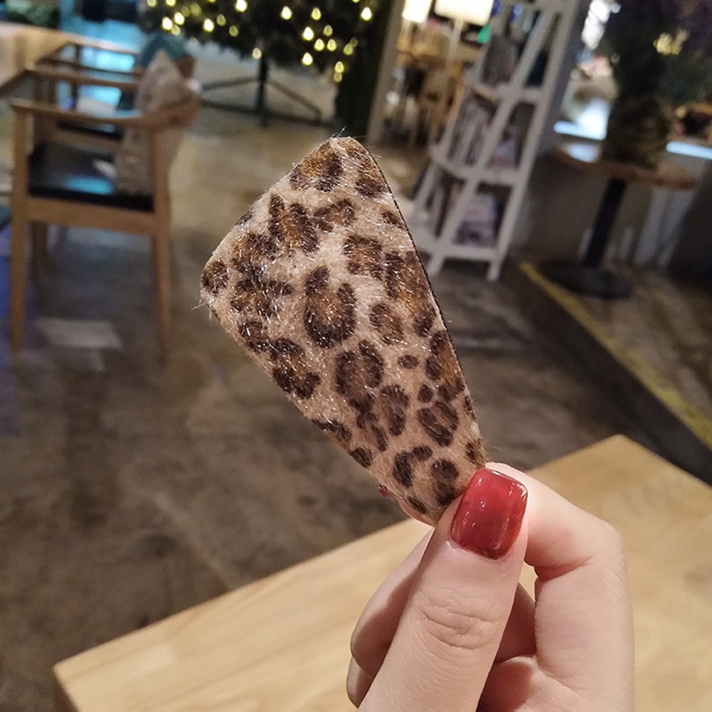 Kẹp tóc hình lông vũ thời trang