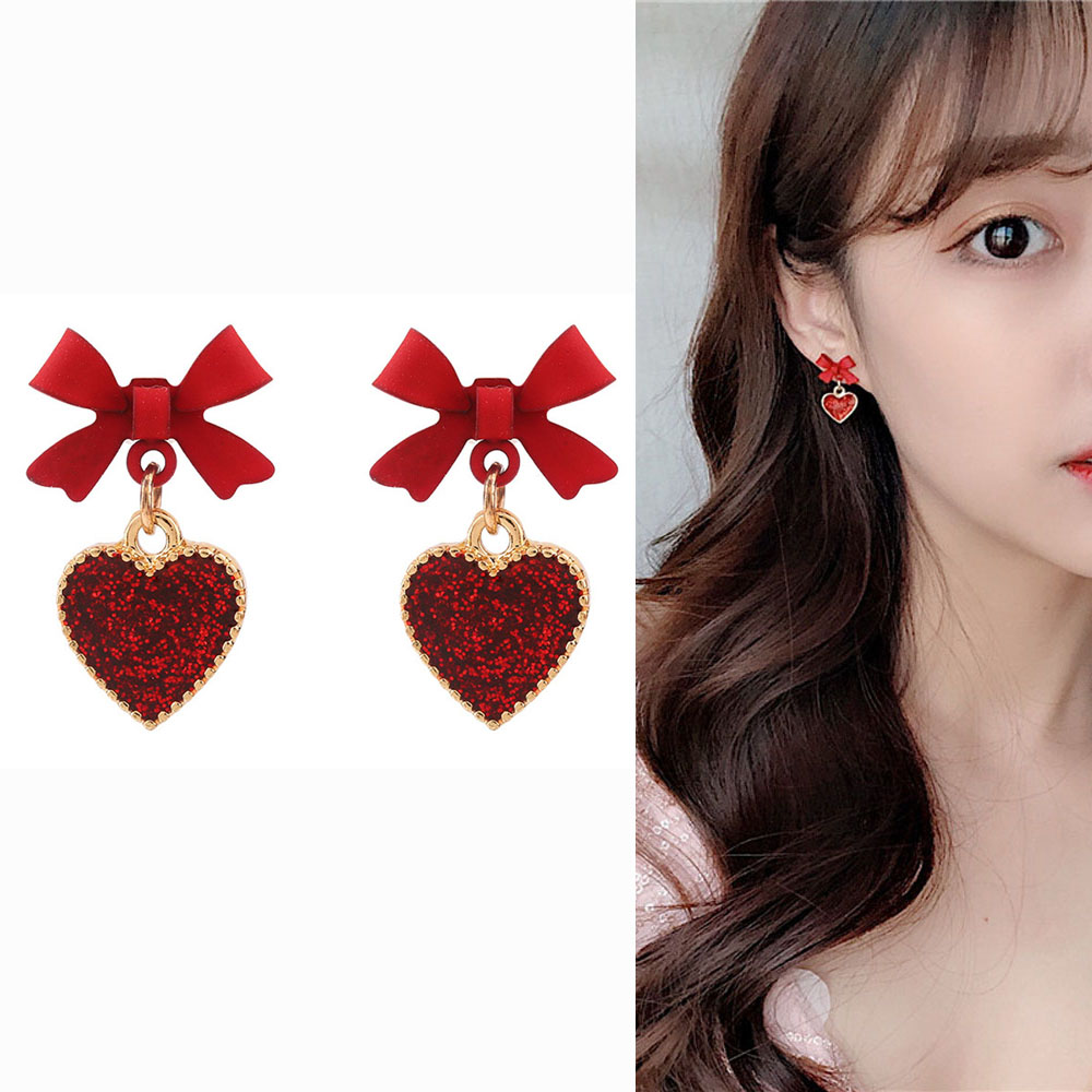 Cặp bông tai hình nơ gắn trái tim màu đỏ đáng yêu cho nữ