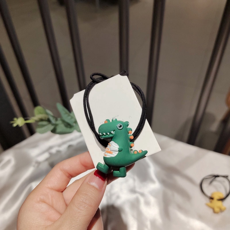 Dây Cột Tóc Hình Khủng Long Xinh Xắn Dành Cho Nữ