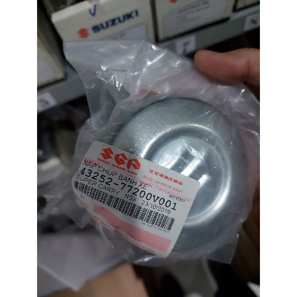 phụ tùng ô tô suzuki chính hãng.Chụp mâm 4 bánh xe truck,blinvan 5 tạ.