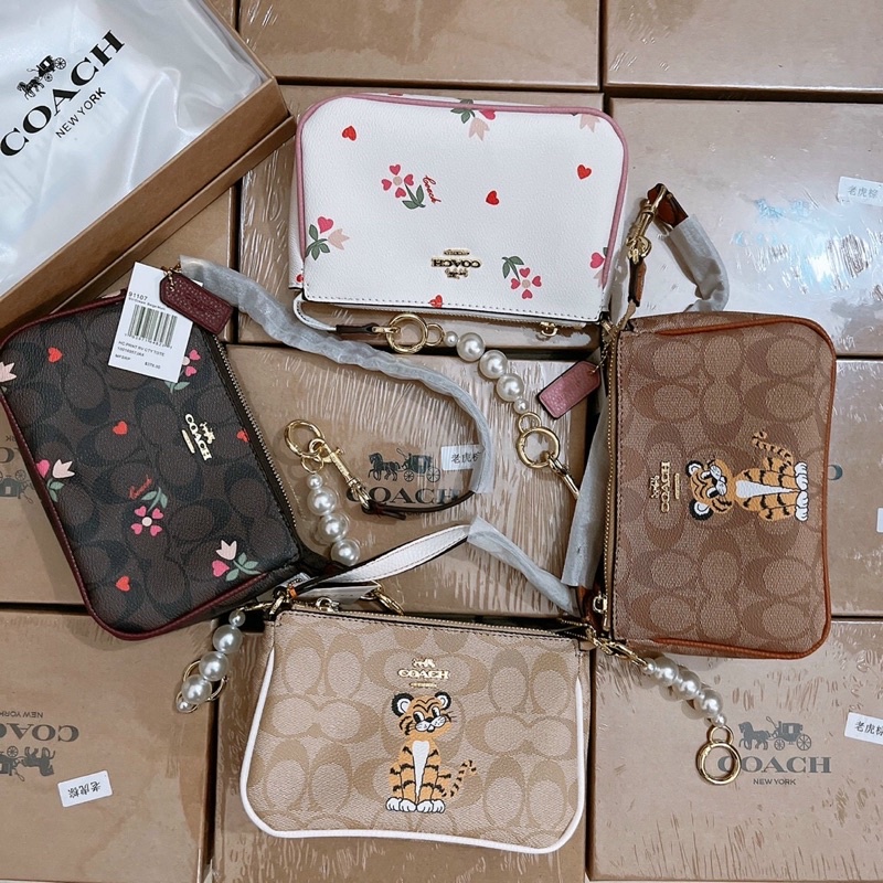 Túi xách nữ mini Coach Nolita kẹp nách xinh xắn, tặng kèm móc ngọc