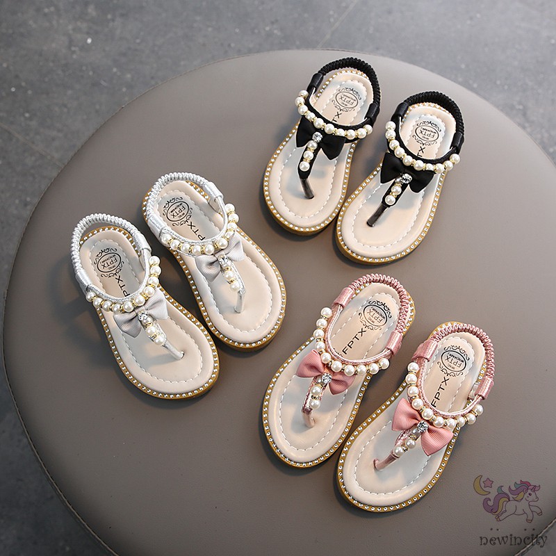 Giày sandal xỏ ngón đính ngọc trai phối nơ phong cách Hàn Quốc cho bé gái