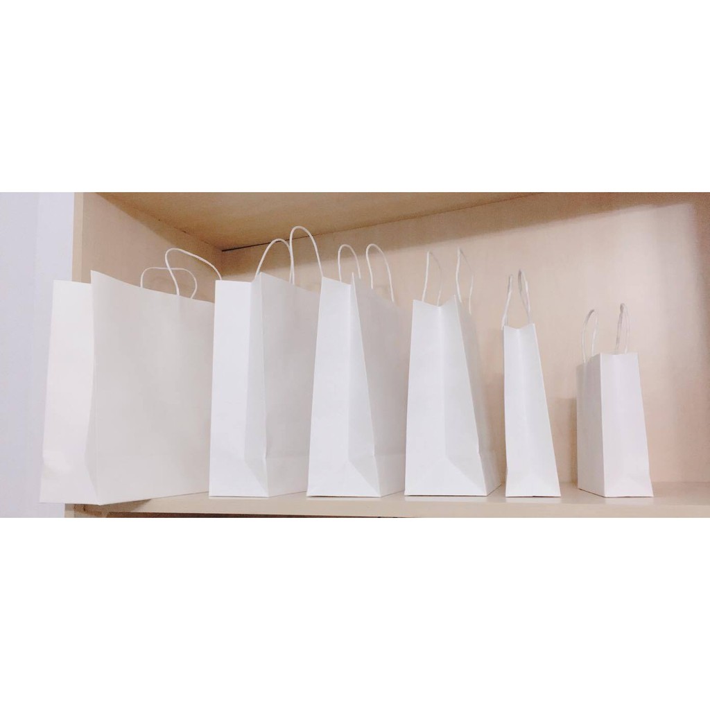 Túi giấy kraft có quai xách 29x24x10cm - màu trắng