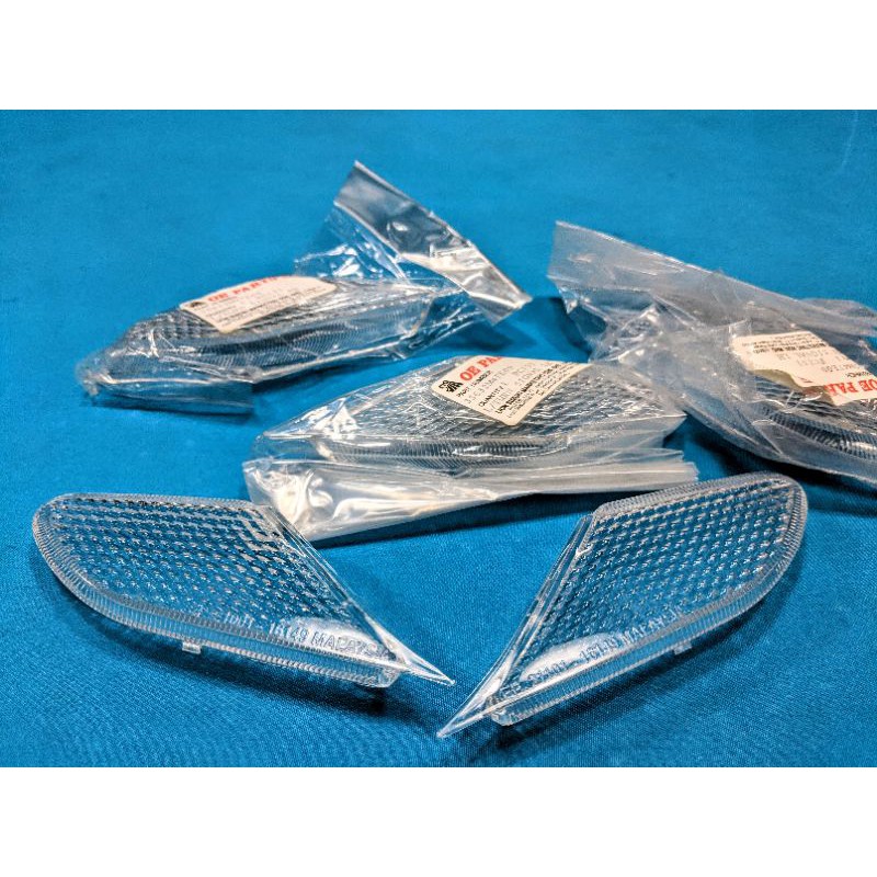 Chụp đèn xinhan trước Suzuki FX 125 chính hãng