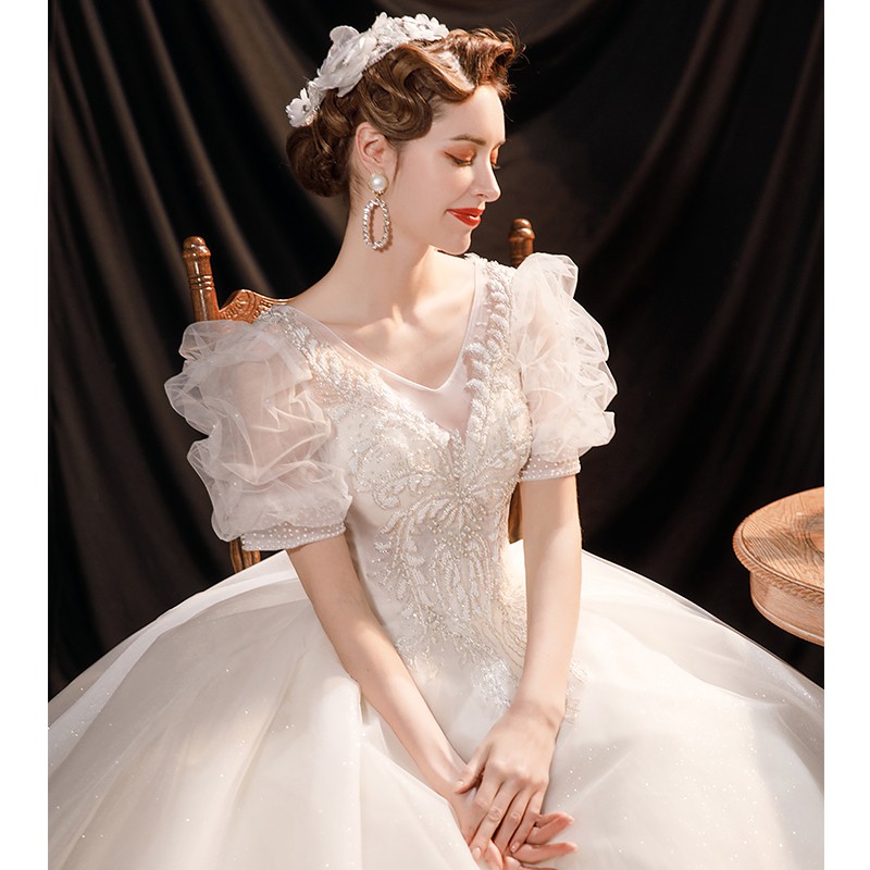 Váy cưới của thiên thần Đẹp ngoài trời trong chuyện cổ tích Công chúa sâu chữ V Tay phồng cô dâu ánh sao 17280