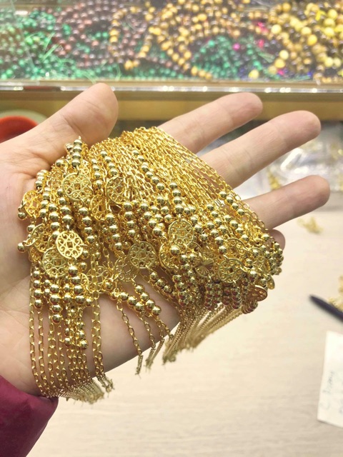 Lắc chân tay và dây cổ kim tiền