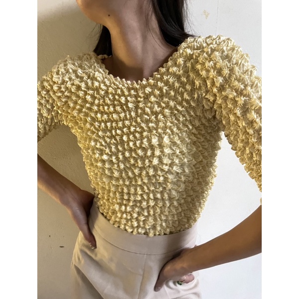 Áo popcorn nhún tay lửng