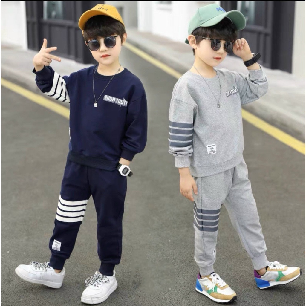 bộ đồ thể thao dài tay thu đông cho bé chất nỉ da cá 8-18kg