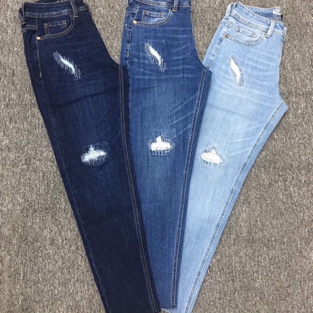 Quần jeans thêu lai tua