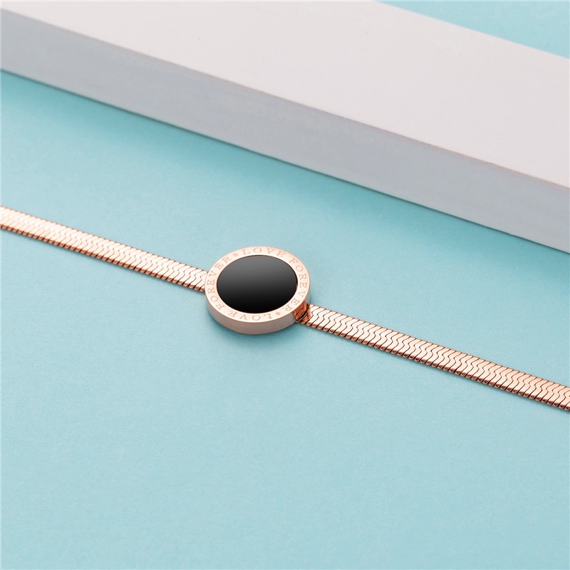 Vòng Tay Xương Rắn Đen Bằng Titan Chống Rỉ Sét
