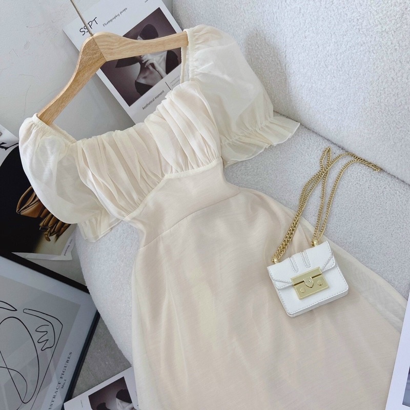 Đầm Midi Kem Xếp Ly Nhún Ngực Tay Bồng Thắt Nơ Lưng