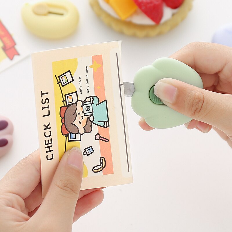 Dao rọc giấy thiết kế hình dấu chân mèo xinh xắn dễ thương