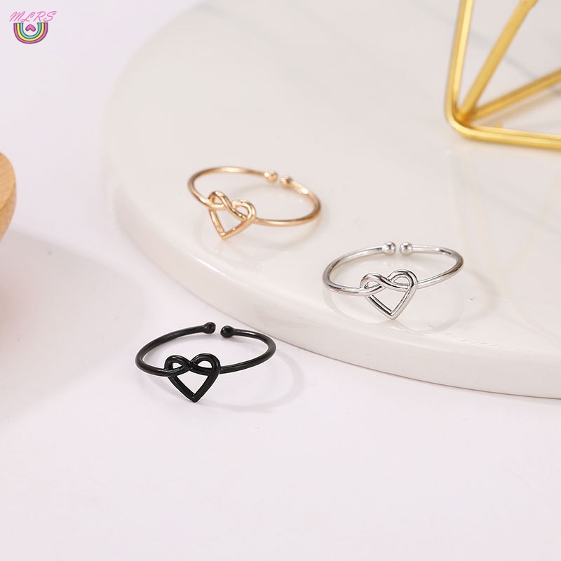 Nhẫn hợp kim hình trái tim xoắn rỗng có thể điều chỉnh thời trang cho nữ