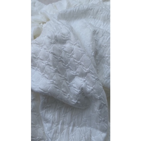 Vải thun thêu trắng