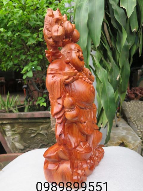Tượng phật di lặc cưỡi cá chép gỗ hương cao 40cm