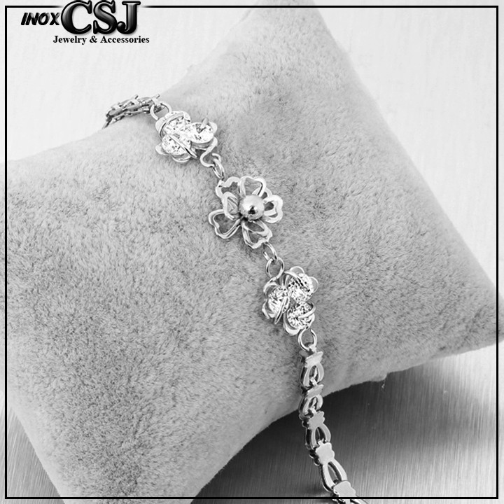 Lắc tay nữ 3 viên đá xoay gắn cỏ 4 lá nhỏ xinh