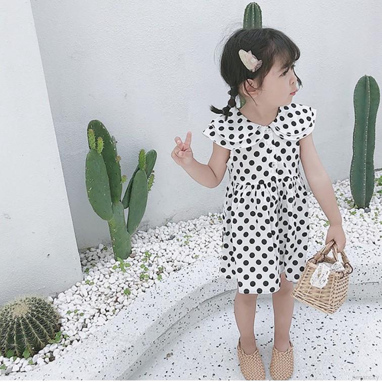 Đầm sát nách chấm bi cho bé gái