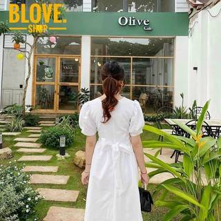 Đầm trắng form dài lệch tà