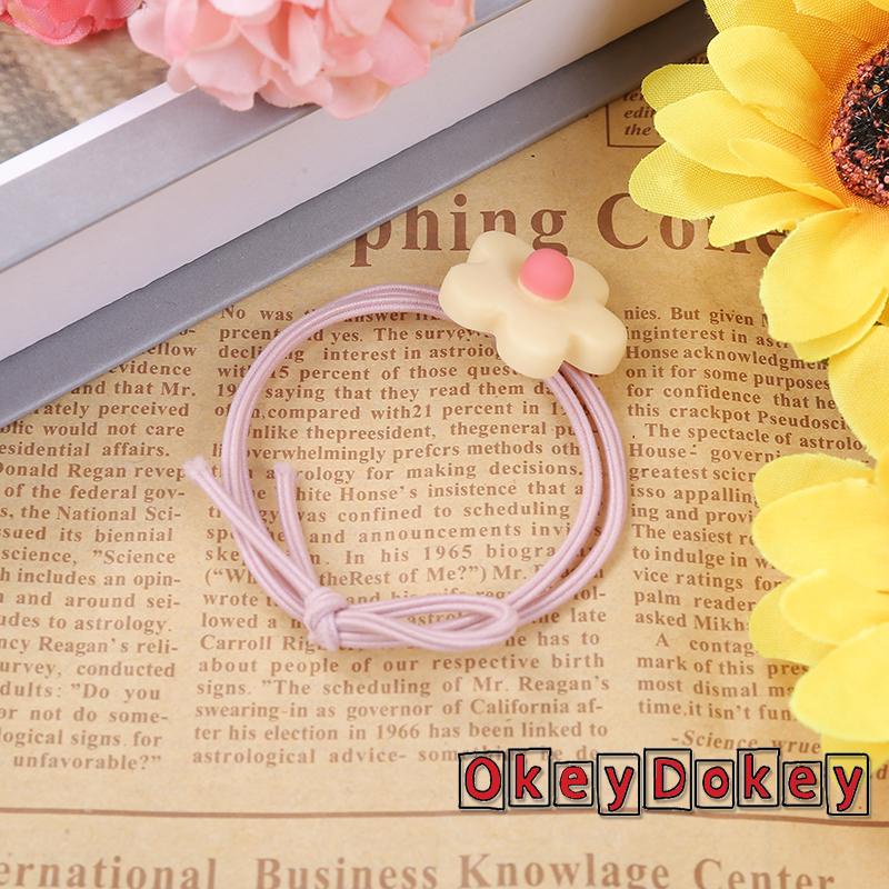 Dây buộc tóc cao su đính hoa dễ thương cho nữ