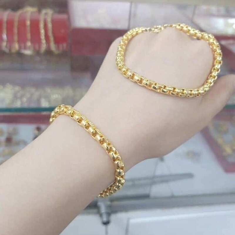 Lắc tay lắc chân công titan cam kết không đen không gỉ có size em bé Kami