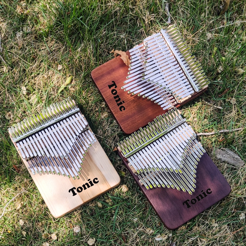 [ Giá rẻ dùng thử] Đàn kalimba 42 phím Tonic gỗ nguyên khối KOA- Hàng chính hãng tặng Túi rút, Tab
