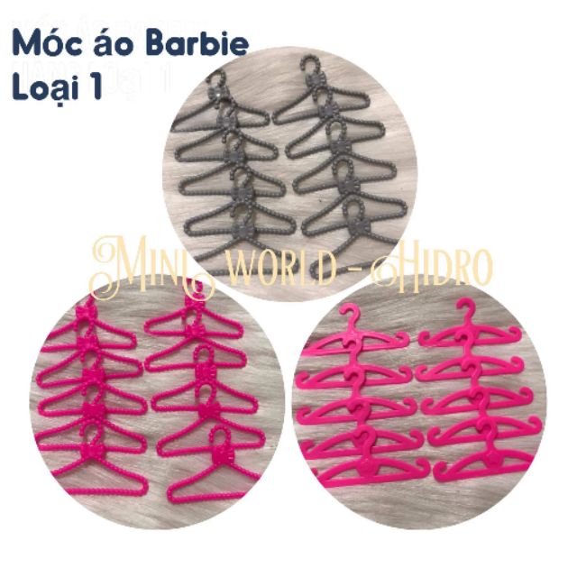 Sét 10 chiếc móc quần áo búp bê Barbie.