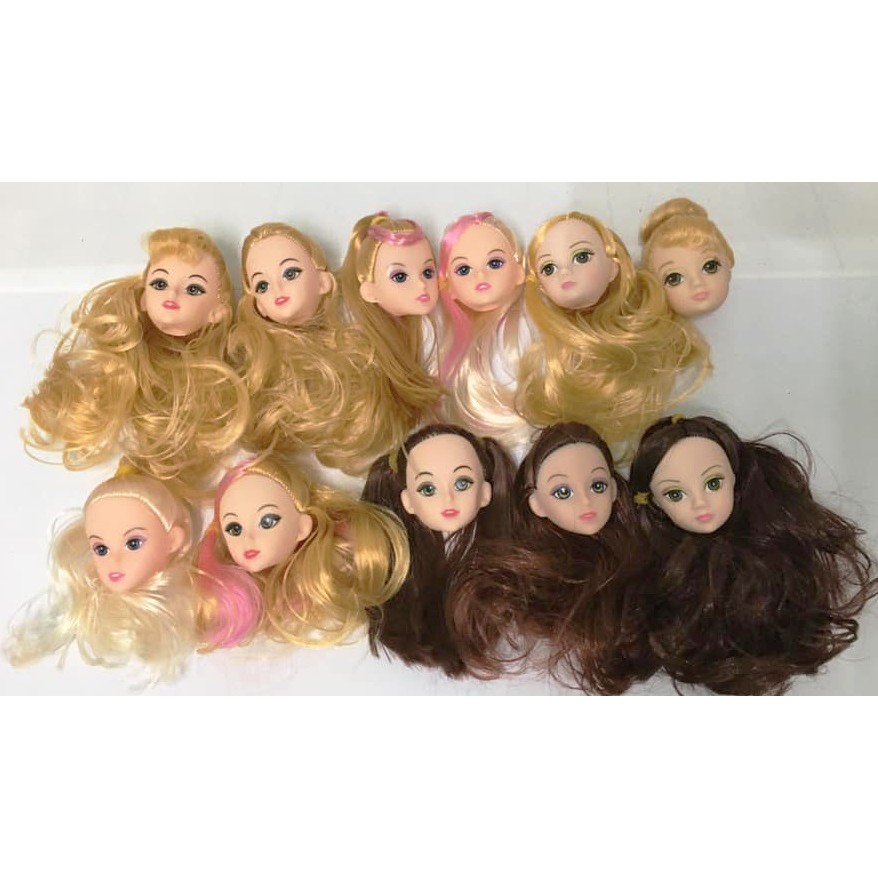 Đầu búp bê mắt vẽ