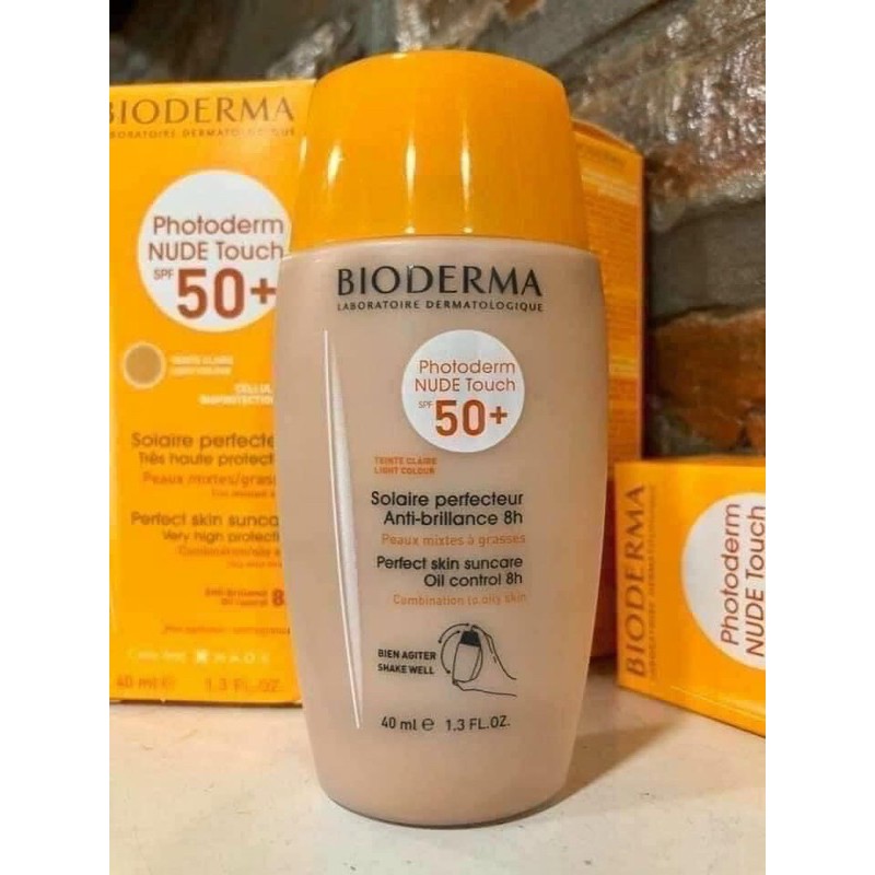 Kem chống nắng vật lý kiêm kem nền Bioderma photoderm nude touch spf 50 - Chính hãng