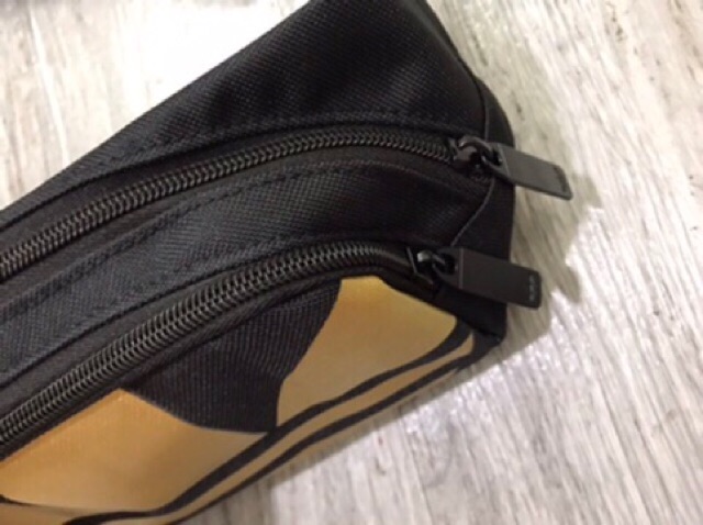 Túi bao tử logo vàng