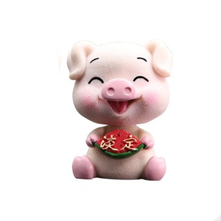 TƯỢNG MỘT CHÚ HEO MAY MẮN LẮC LƯ ĐẦU DỄ THƯƠNG TRANG TRÍ TAPLO XE Ô TÔ
