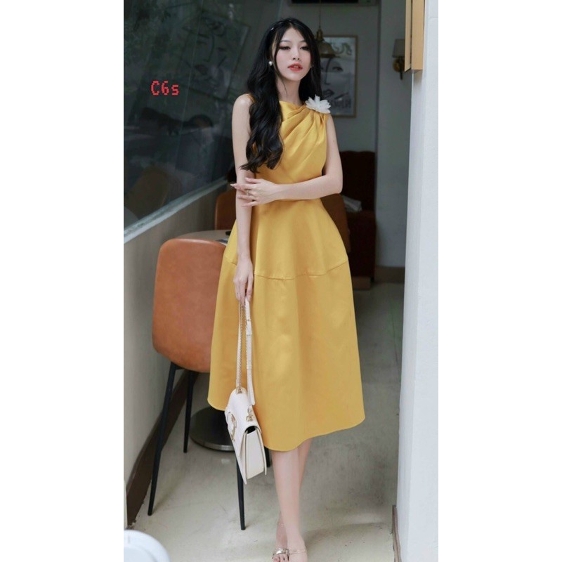 Đầm xoè đính bông dễ thương. TK