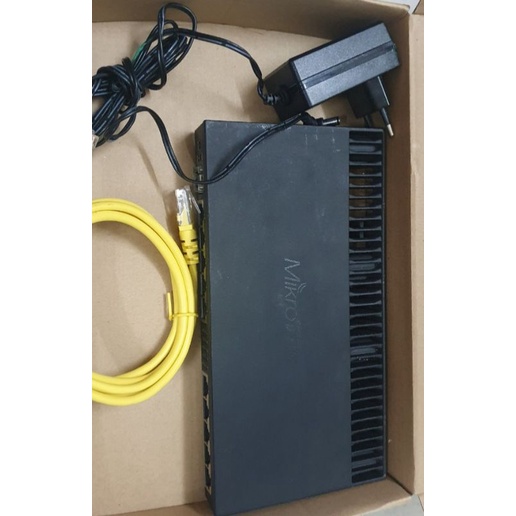 Cân bằng tải mikrotik 4011 kèm tai rack hàng sài rồi tốt