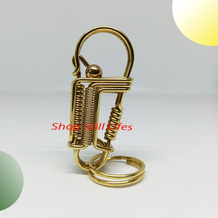 móc khóa đồng thau mô hình chim cánh cụt canh kho báu
