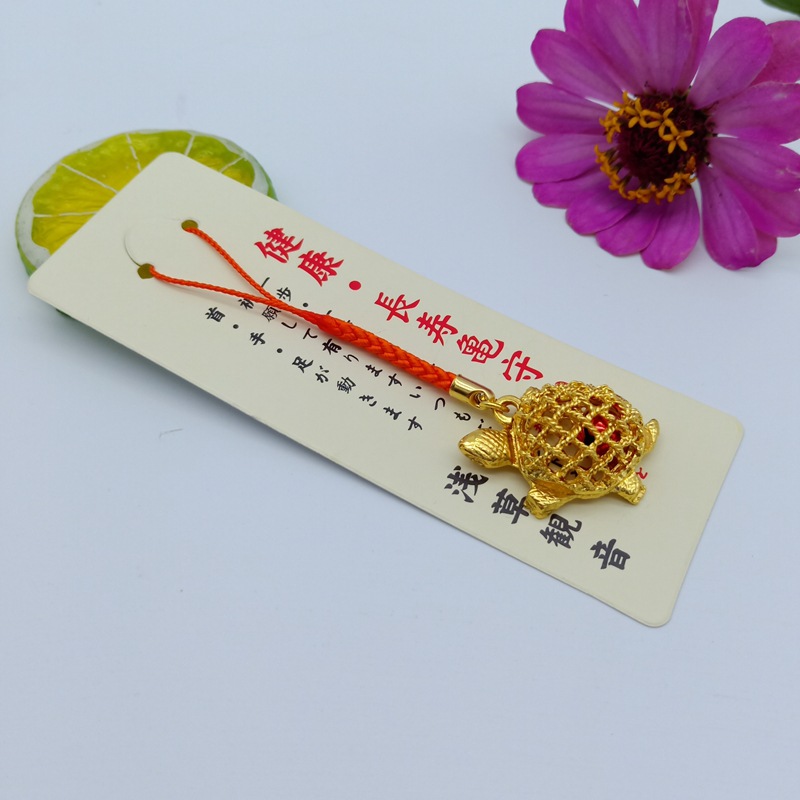 Hole Engraved Golden Turtle Bell
