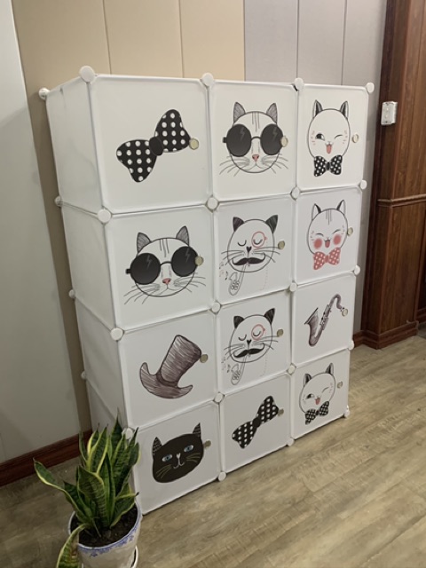 TỦ NHỰA QUẦN ÁO LẮP GHÉP 12 Ô SÂU 47cm( thân hồng phấn cửa kitty chấm bi). Tặng 2 móc treo