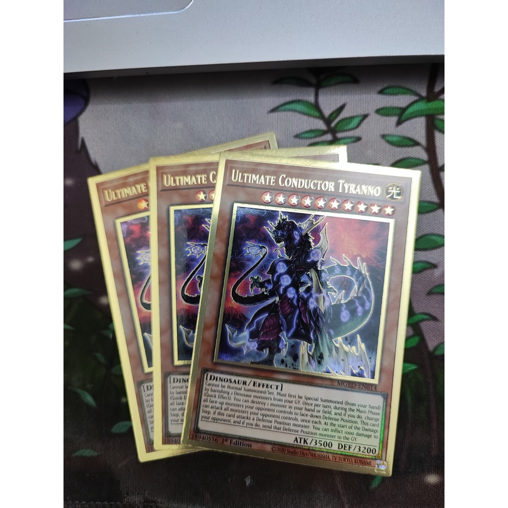 [Yugioh Funny Shop] 1 lá thẻ bài Ultimate Conductor Tyranno - MGED-EN014 - Premium Gold Rare 1st Edition